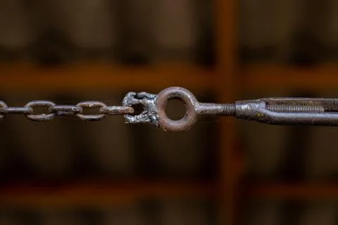 A joint between two chains for fixing things. Stock Photos