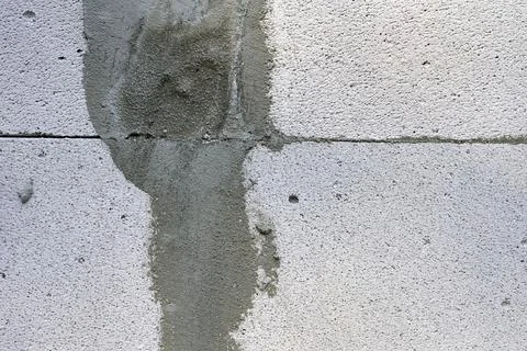 Joint between two concrete blocks, sealed with cement Stock Photos