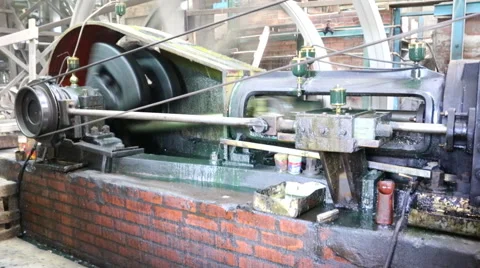 Joint of old machine working by water steam engine in agricultural factory Stock Footage 59636959