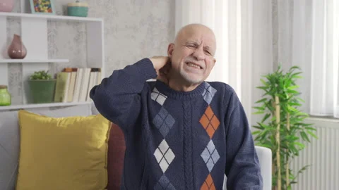 Joint pain. Elderly man with neck pain massaging his neck with his hands. Stock Footage 219693446