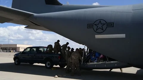 Joint Task Force Holloman AFB soldiers and airmen receive first Afgan refugees Stock Footage 161155255