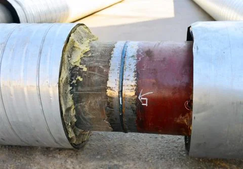 Joint of two pipes for a thermal network Stock Photos