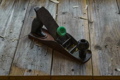 Jointer is vintage hand tool in a workshop on workbench Stock Photos