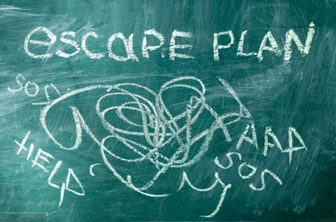 Joking evacuation plan drawn on school blackboard with chalk Positive thinkin Stock Photos