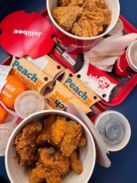 Jollibee chicken feast draws eager diners Stock Photos