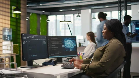 Jolly female programmer at office desk pleased after developing application Stock-Footage 313017094