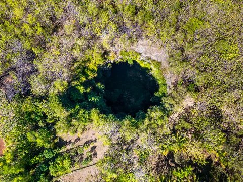 Jomblang cave in Gunungkidul is a doline formed by a cave collapse a large, n Stock Photos