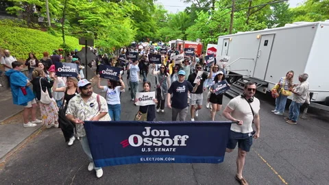 Jon Ossoff supporters walk in annual Atlanta parade Stock-Footage 342365042