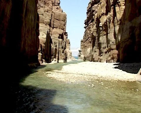 Jordan. Mujib River canyon of Wadi Mujib is lowest nature reserve in the world Stock Footage 126957815
