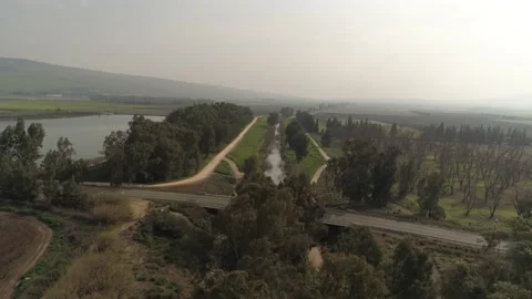 Jordan river aerial down fields Stock Footage 139732535