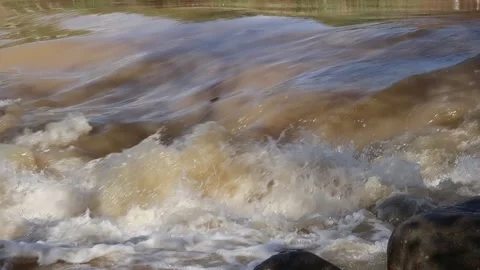 Jordan river flowing over rapids after heavy rains Stock Footage 146612473