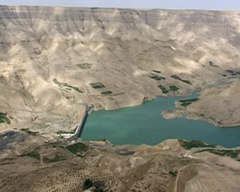 Jordan. View to Wadi Al Mujib Dam in Arnon Gorge with freshwater lake after dam Stock-Footage 126008608
