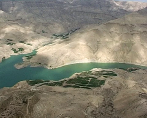 Jordan. View to Wadi Al Mujib Dam in Arnon Gorge with freshwater lake after dam Stock-Footage 126008635