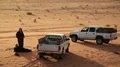 Jordanians near his cars in Wadi Rum desert, Hashemite Kingdom of Jordan HD Footage