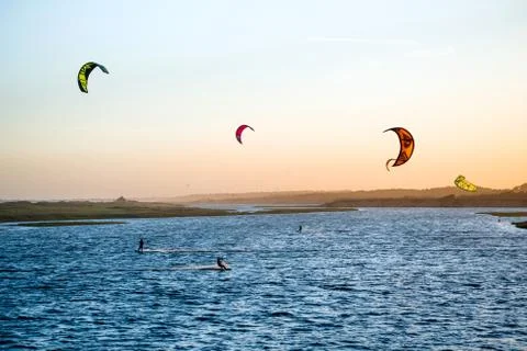 Jose Ignacio, Uruguay: Kiters on the Garzon Bay are using last summer days Stock Photos