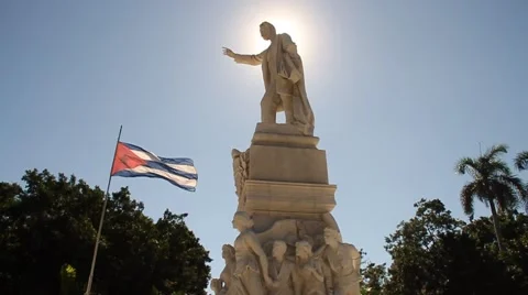 Jose Marti statue at Havana's Central Park, Old Havana with sun flare Stock Footage 45521941