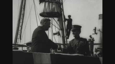 Josephus Daniels and Commander Albert Cushing Read shaking hands on deck of ship Stock Footage