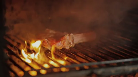 Josper, burn the fire,Big flames in the barbecue with a steak,grilled veal ribs Video stock 150400641