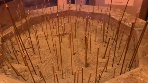 Joss sticks burning in temple Stock Footage 242162930