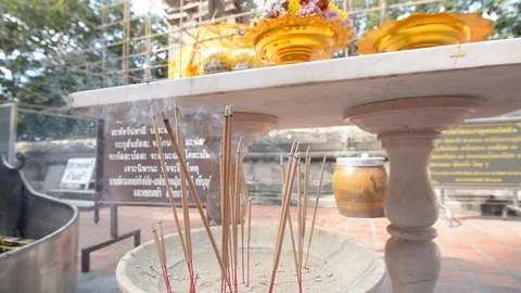 Joss sticks in pot Stock Footage 83791513
