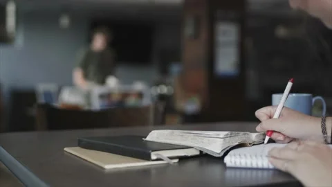 Journaling at a shop Stock Footage 232870235