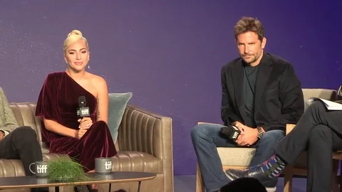 Journalist asks question to A Star Is Born movie cast at press conference 2018 Stock Footage 100167422