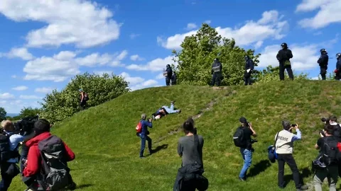 Journalist falling of a cliff during protest Stock Footage 95267159