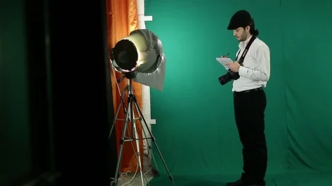 A journalist filming on green screen Stock Footage 77846440