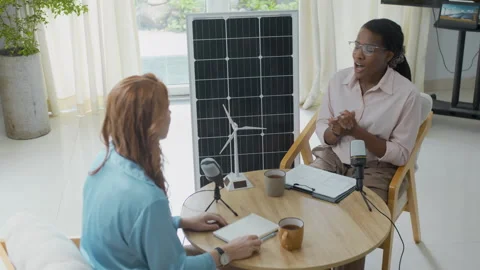 Journalist Interviewing Female Engineer on Alternative Energy Solutions Indoors Stock Footage 301296008