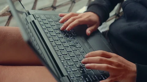 Journalist or writer prints note or message on laptop Stock Footage 173087752