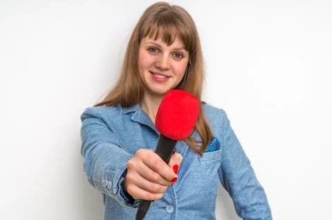 Journalist with red microphone making interview - journalism and broadcasting co Stock Photos