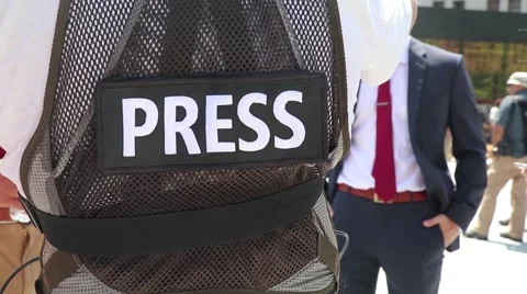 Journalist Wearing Press Vest Stock Footage