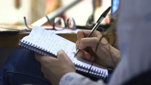 Journalist Writing In A Notebook During A Press Conference Vidéo 127885360