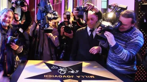 Journalists and photographers take photos star, it was signed famous actress Stock Footage 8921900