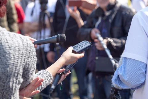 Journalists making media interview during news conference Stock Photos