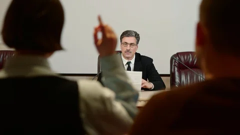 Journalists at a press conference talking each other, back view. Stock Footage 102561795