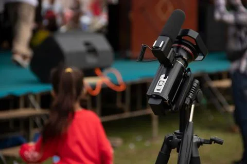 A journalist's video camera Stock Photos