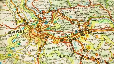 Journey to Basel, Switzerland – smooth camera movement over atlas map Stock Footage 344639903