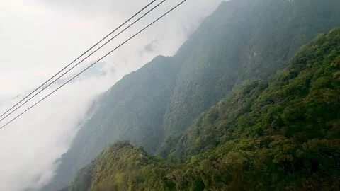 Journey down the mountain peak using cable car 스톡 동영상 342536337