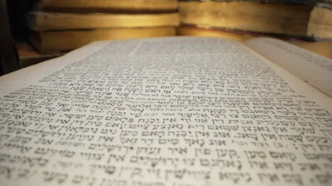 Journey through sacred Ketuvim scriptures. Revered texts in macro footage. Old Stock Footage 265084703