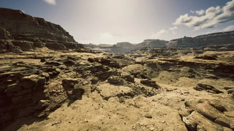 Journey through sunlit rocks with dramatic shadows and scenic views Stock Footage 340659141