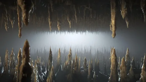 Journey through an underground cave full of stalactites and stalagmites. 4KHD Stock Footage 110096055