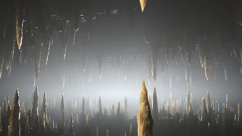 Journey through an underground cave full of stalactites and stalagmites. 4KHD Stock Footage 110129654