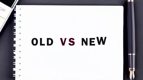 A journey of words unfolds on a pristine white page. The phrase old versus new Stock Footage 331864207