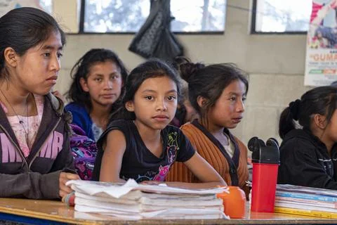 Joven escribiendo, escuela de primria, Patzojn Chiquito, Quiche, Guatemala, A Stock Photos