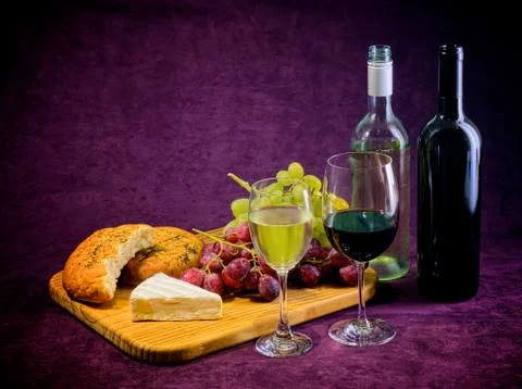 The joy of wine, bread and cheese Stock Photos
