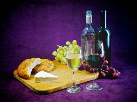 The joy of wine, bread and cheese Stock Photos