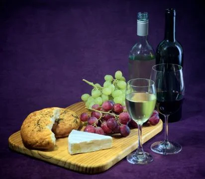 The joy of wine, bread and cheese Stock Photos