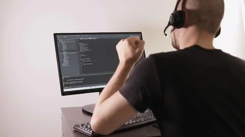 Joy at work. Working at the computer with a sense of fun. Information technology Stock-Footage 129434374