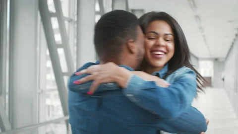 Joyful African American Couple Hugging And Spinning Meeting In Airport Stock Footage 153526853